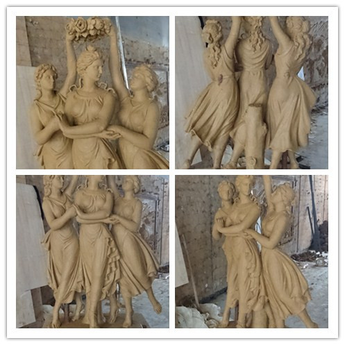 clay mold of three graces